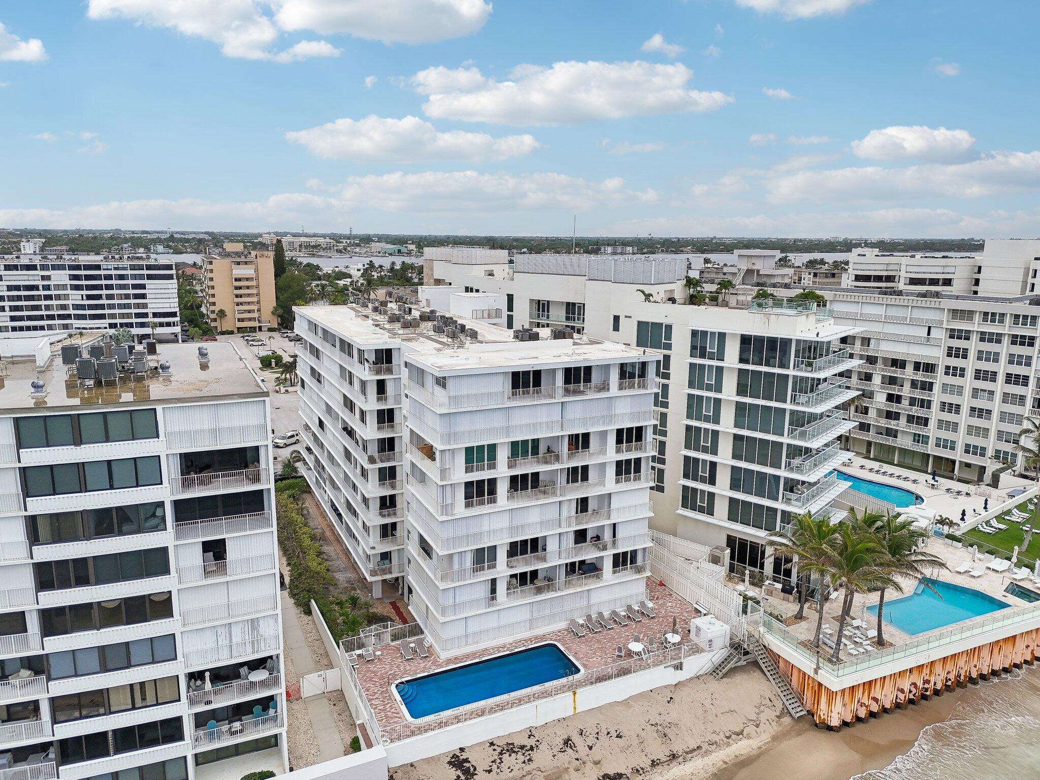 3580 South Ocean Boulevard, Unit 4C South Palm Beach, FL 33480 - Photo 29 of 36 a view of a city with tall buildings