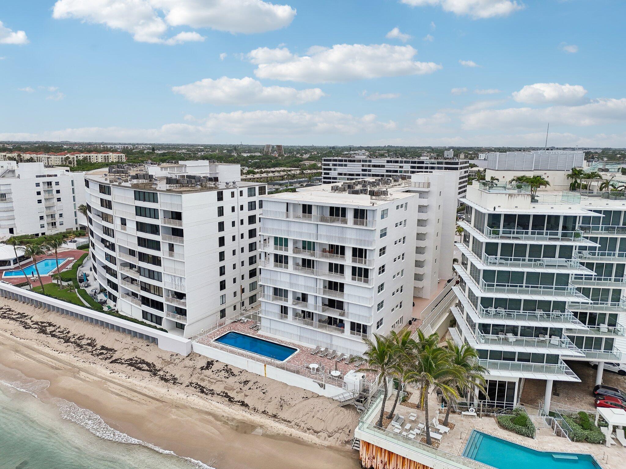3580 South Ocean Boulevard, Unit 4C South Palm Beach, FL 33480 - Photo 30 of 36 a view of a buildings with sky view