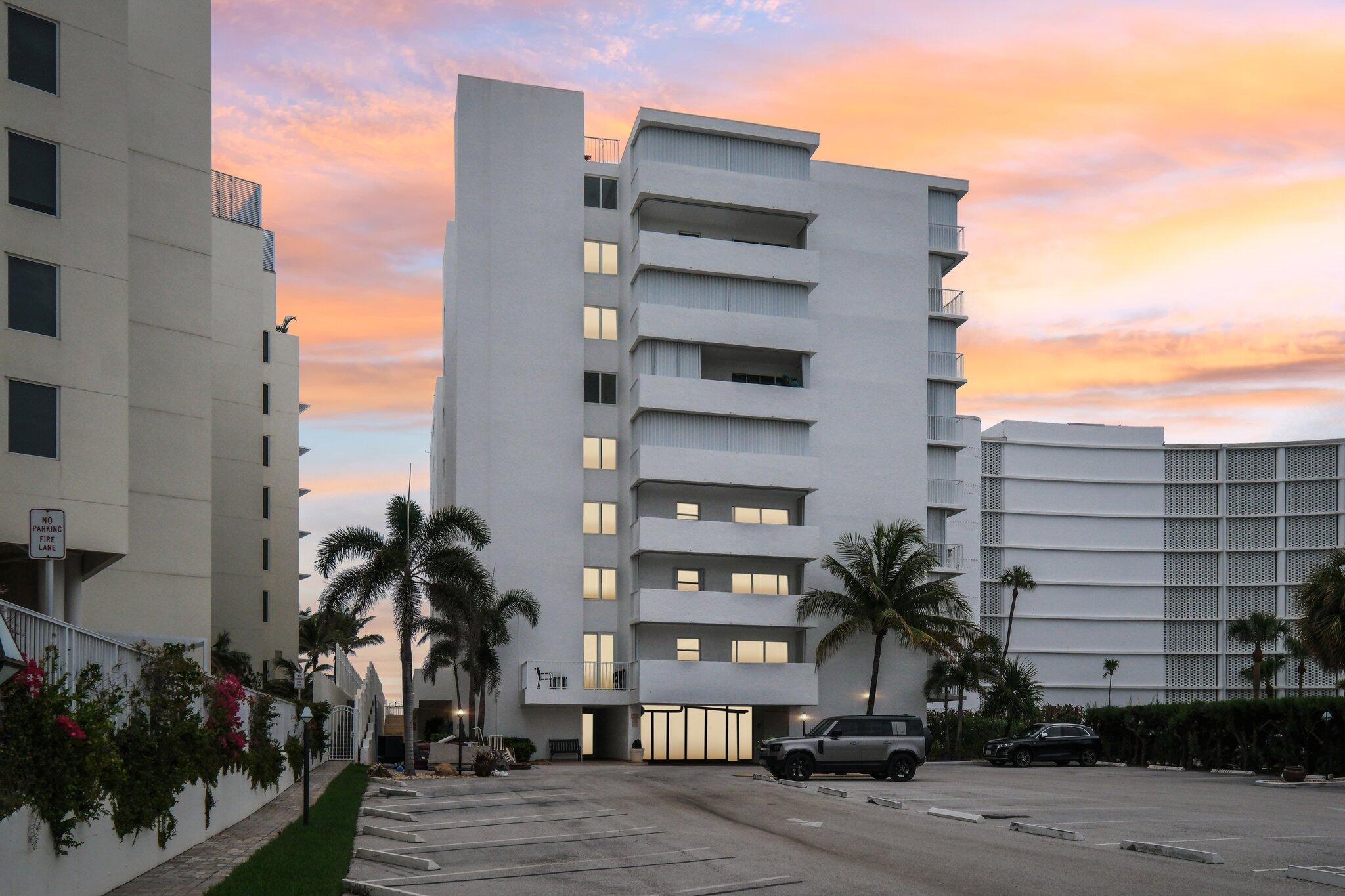 3580 South Ocean Boulevard, Unit 4C South Palm Beach, FL 33480 - Photo 34 of 36 a front view of a multi story building