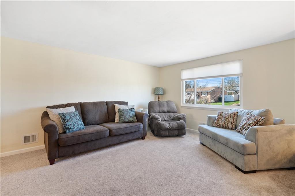 2027 Cutter Drive McKees Rocks, PA 15136 - Photo 7 of 22 a living room with furniture and a large window