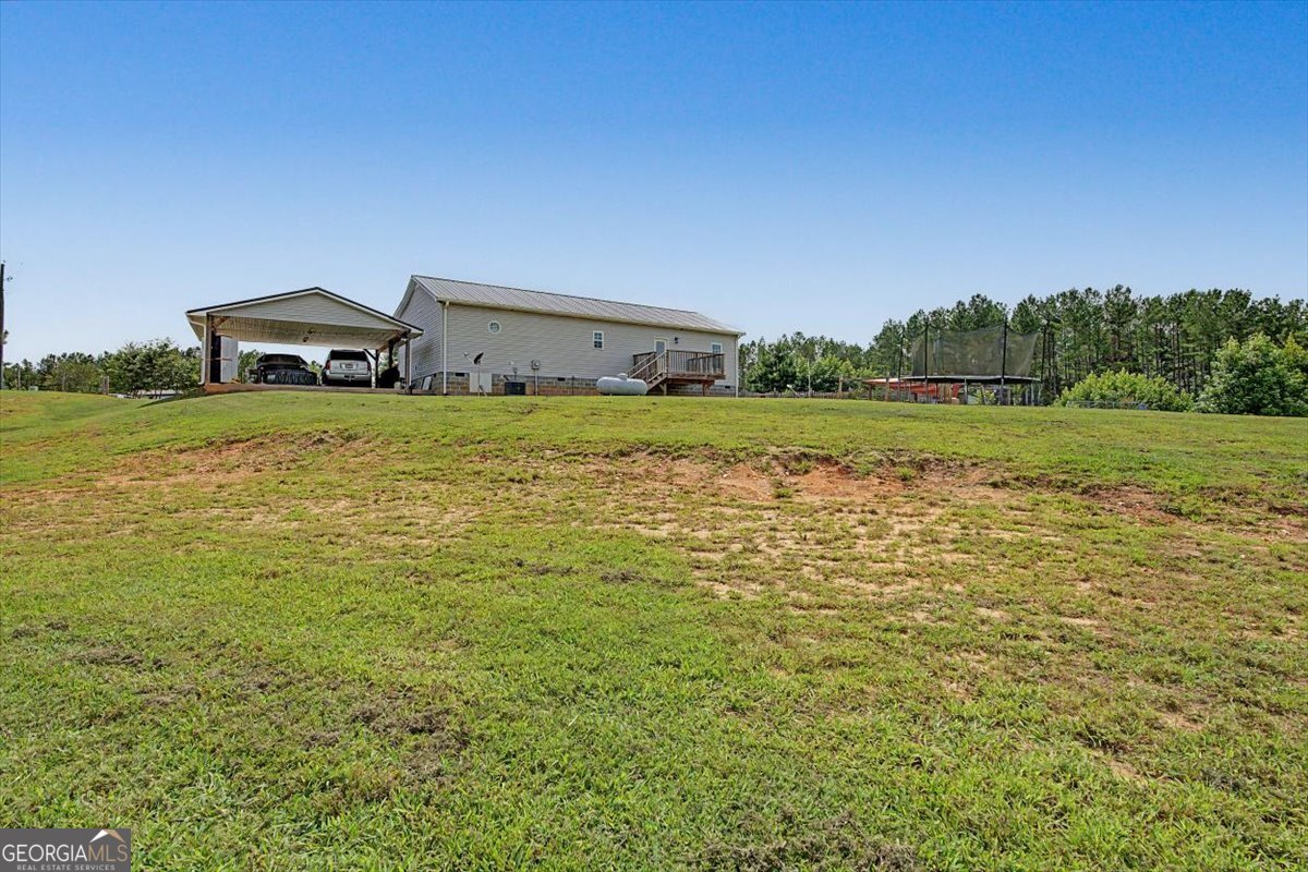 147 Edgar Bell Road Tallapoosa, GA 30176 - Photo 38 of 49 a house view with a lake view