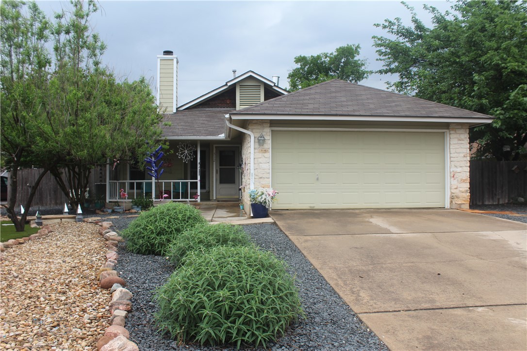 512 Edwards Drive Round Rock, TX 78664 - Photo 1 of 1 a front view of a house with garden