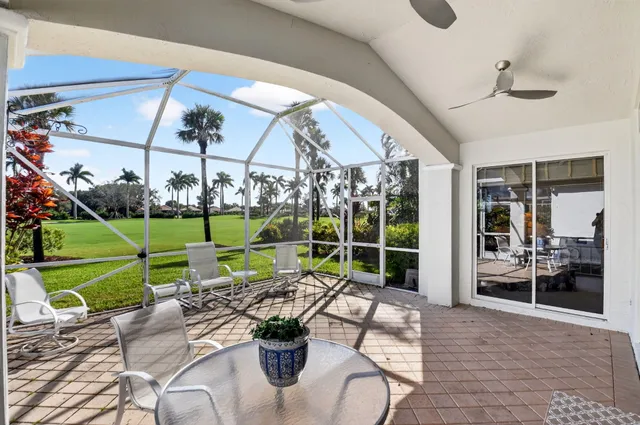 a bathroom with a glass door shower and a sink