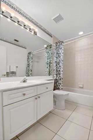 an aerial view of a house with outdoor space swimming pool and ocean view