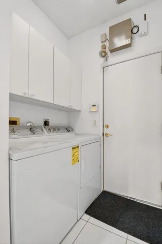 an aerial view of a house with a garden and plants
