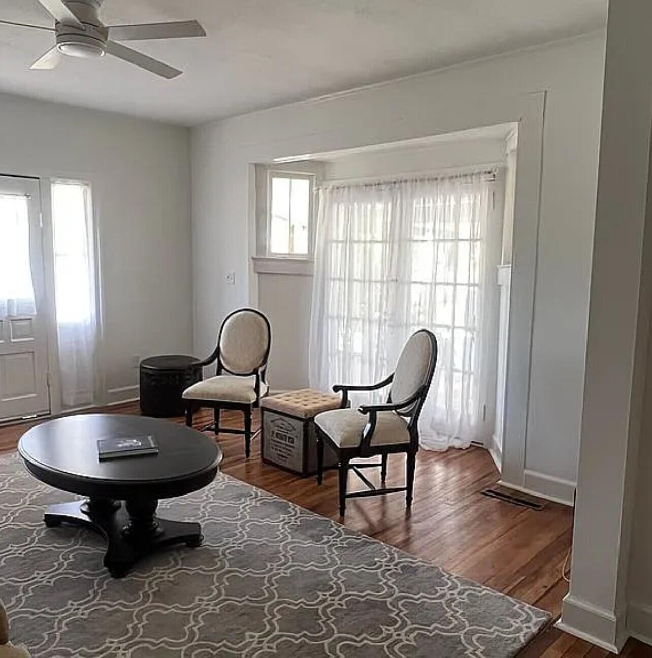 611 Aiken Street Springfield, SC 29146 - Photo 8 of 22 a living room with furniture and a window