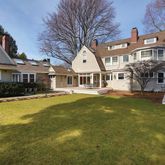 a front view of a house with swimming pool