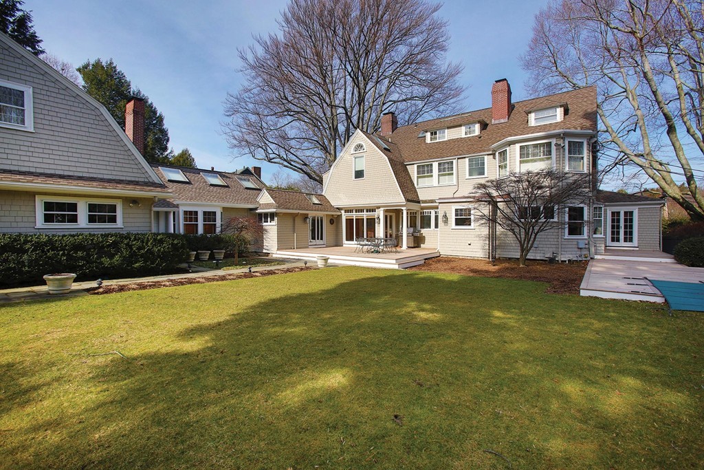 a front view of a house with swimming pool