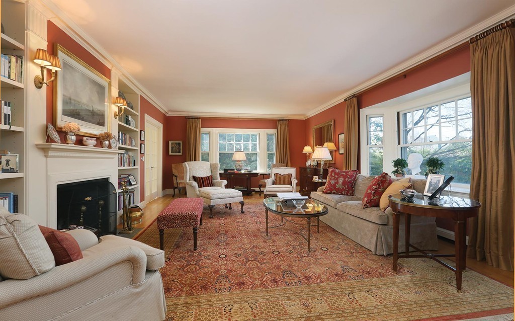 55 Devon Road Brookline, MA 02467 - Photo 3 of 12 a living room with furniture fireplace and a large window