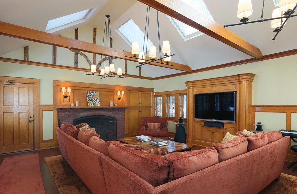 55 Devon Road Brookline, MA 02467 - Photo 10 of 12 a living room with furniture and a flat screen tv