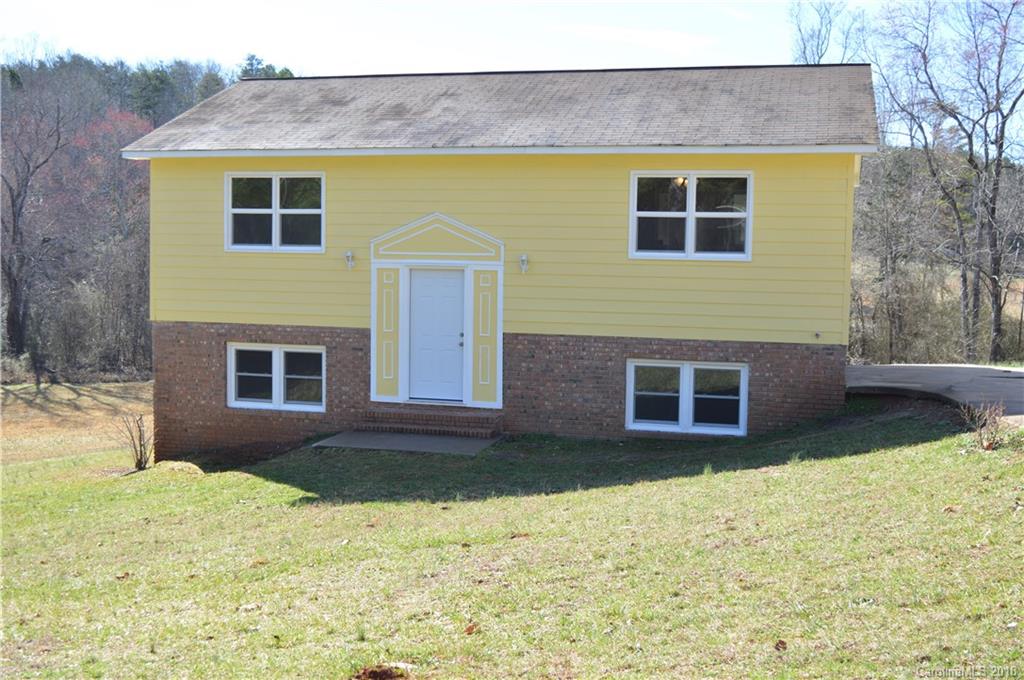 266 Cardinal Road Spindale, NC 28139 - Photo 12 of 15 a front view of a house with a yard and garage