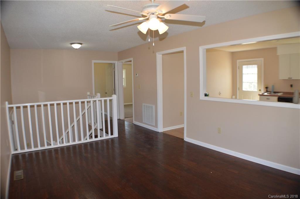 266 Cardinal Road Spindale, NC 28139 - Photo 14 of 15 wooden floor in an empty room with a window