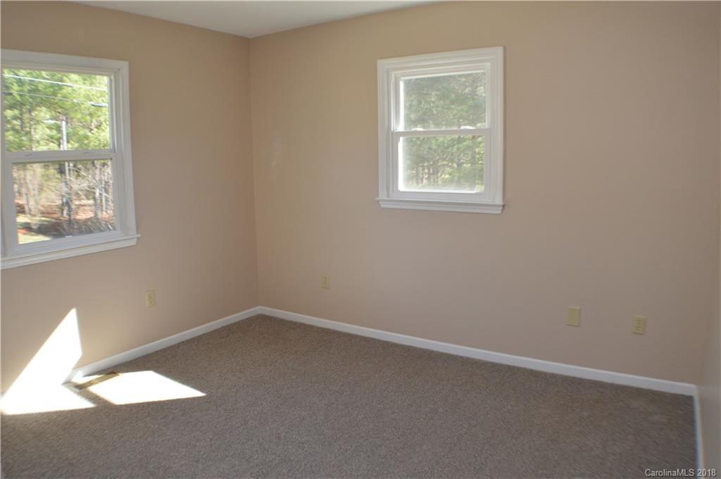 266 Cardinal Road Spindale, NC 28139 - Photo 7 of 15 an empty room with a window