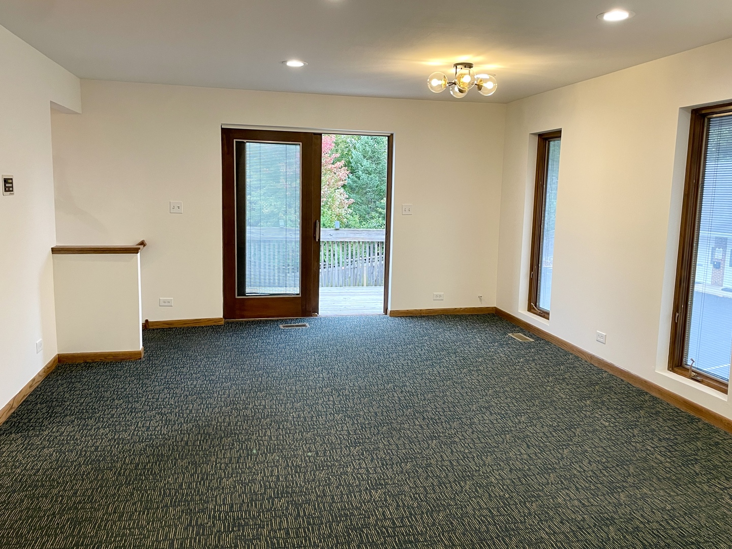 5145 Washington Street, Unit 2 Downers Grove, IL 60515 - Photo 7 of 16 a view of an empty room with a window