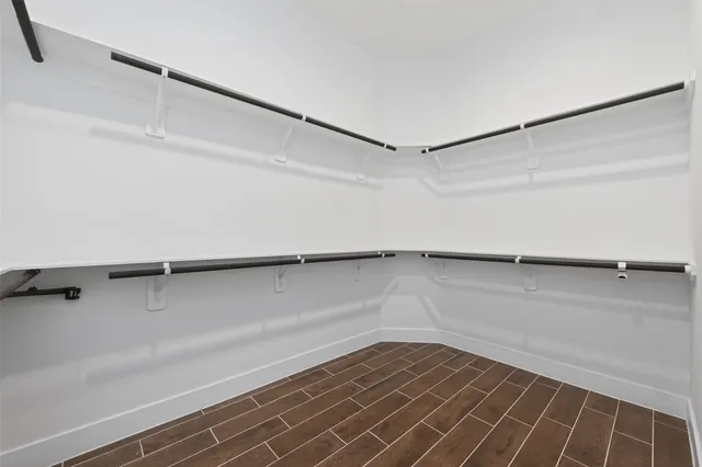 a view of an empty walk in closet