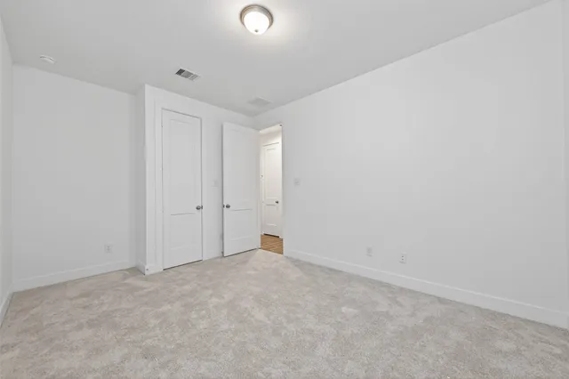 an empty room with an entryway
