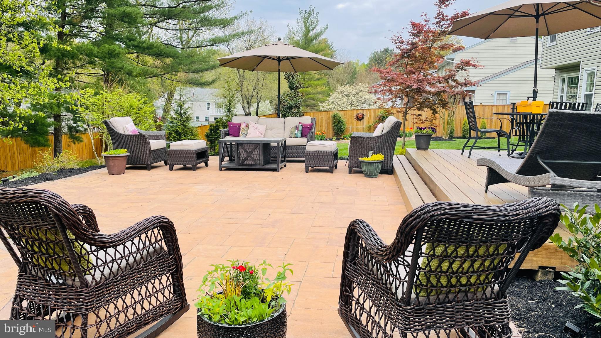 13900 Turnmore Road Silver Spring, MD 20906 - Photo 9 of 65 Circular fire pit w/ seating wall + lighting