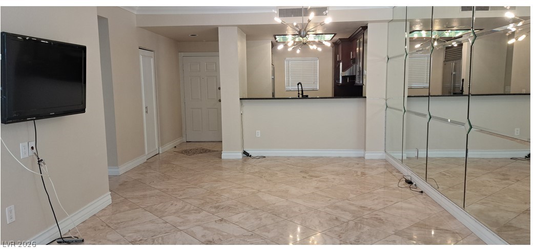 270 East Flamingo Road, Unit 227 Las Vegas, NV 89169 - Photo 12 of 12 This bright interior features tile flooring and a spacious open floorplan.