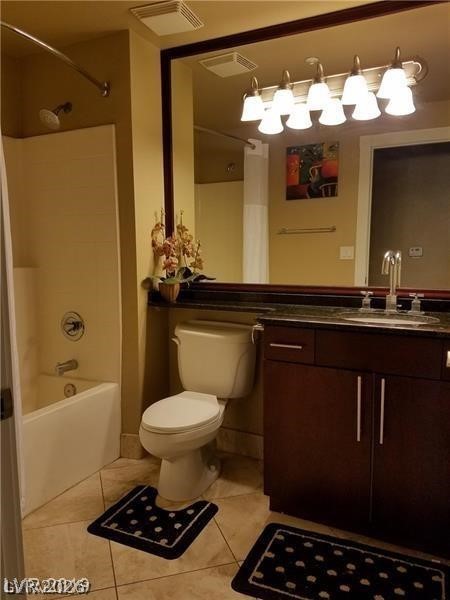 270 East Flamingo Road, Unit 227 Las Vegas, NV 89169 - Photo 7 of 12 A well-appointed bathroom features a practical vanity with ample storage and a combination shower-tub.
