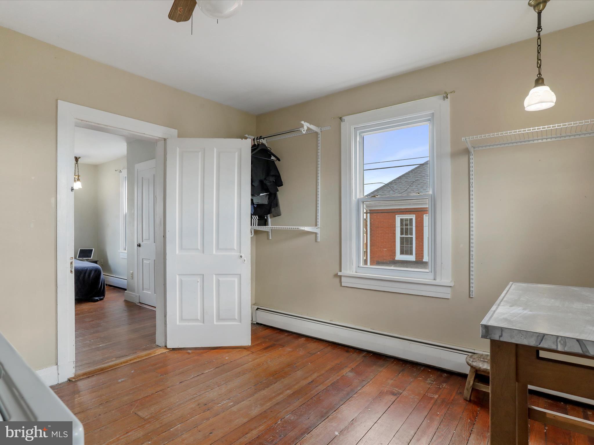 35 Middle Street Taneytown, MD 21787 - Photo 24 of 41 a view of livingroom with hardwood floor and hallway