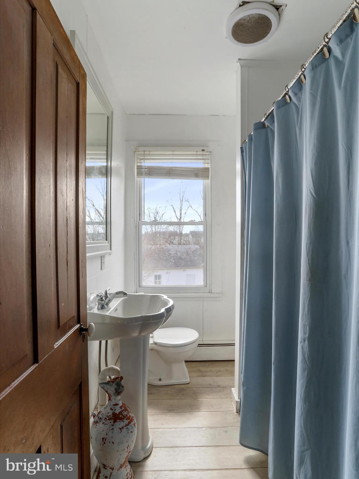 35 Middle Street Taneytown, MD 21787 - Photo 25 of 41 a bathroom with a sink toilet and shower