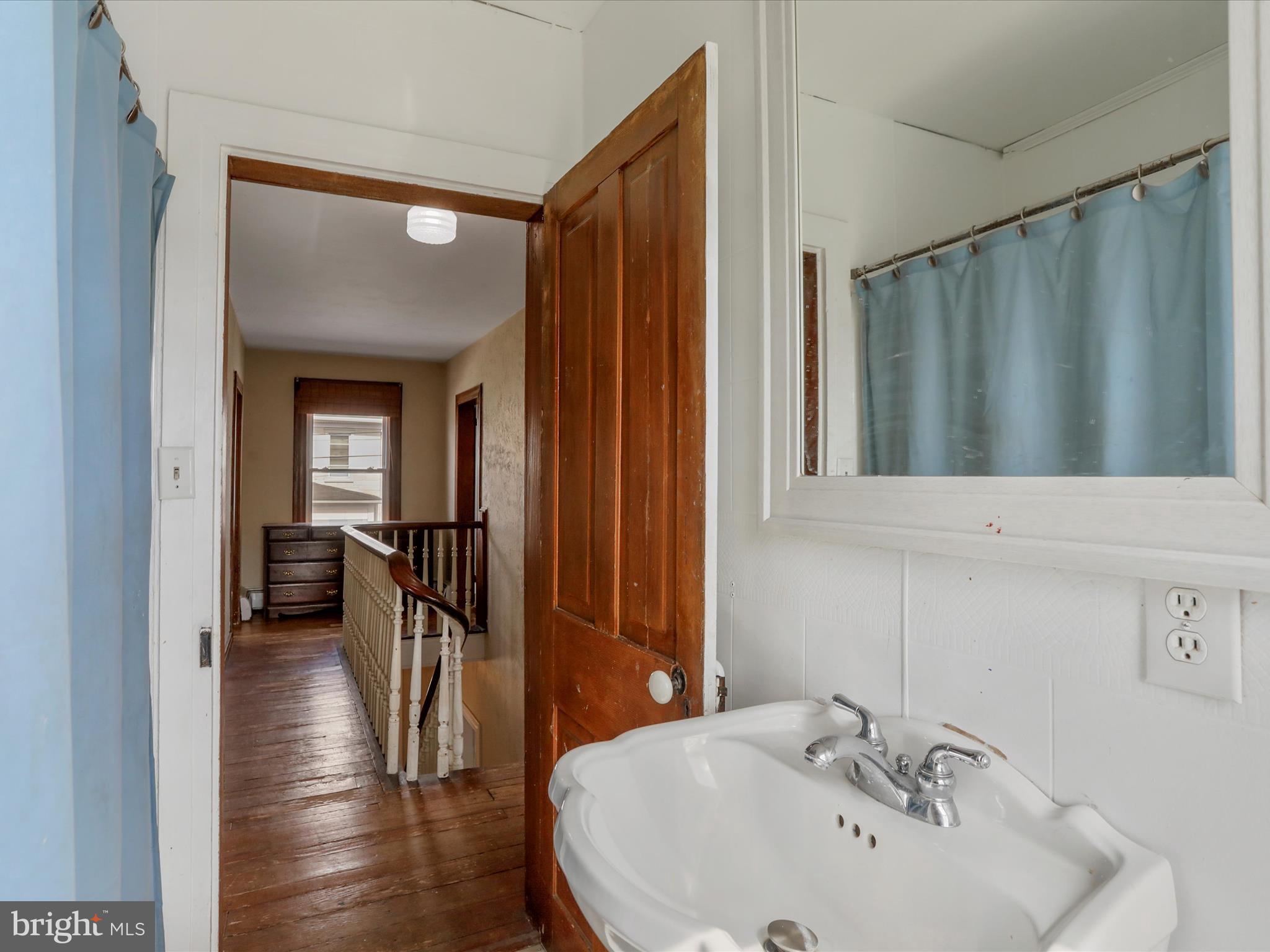 35 Middle Street Taneytown, MD 21787 - Photo 26 of 41 a bathroom with a sink and a mirror