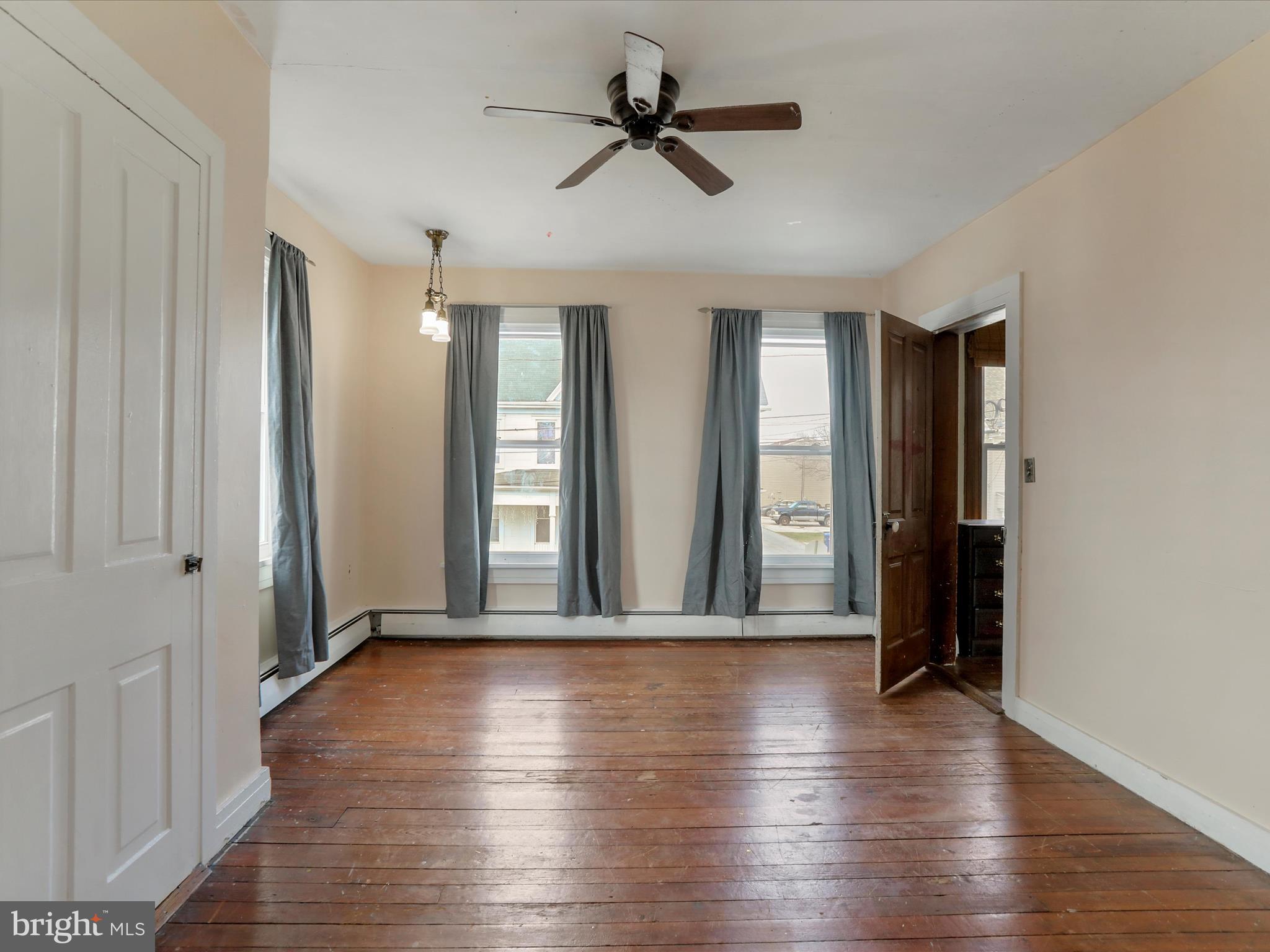 35 Middle Street Taneytown, MD 21787 - Photo 32 of 41 wooden floor in an empty room with a window