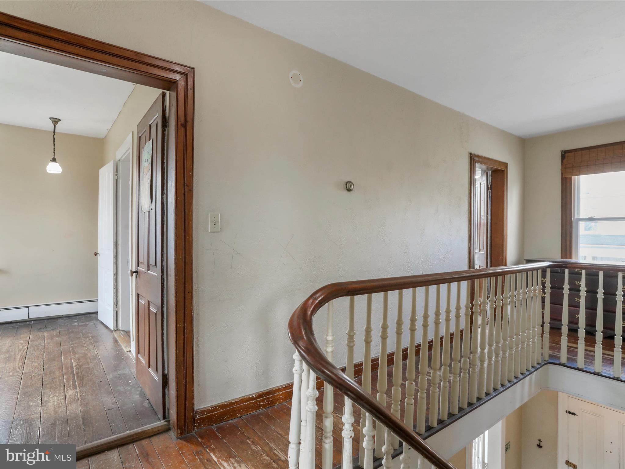 35 Middle Street Taneytown, MD 21787 - Photo 34 of 41 a view of hallway with a window and stairs