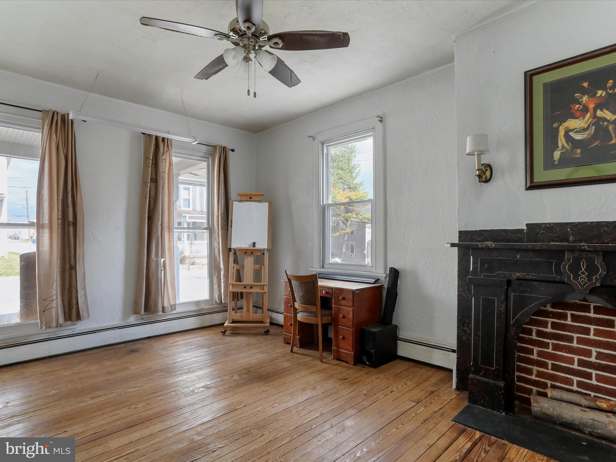 35 Middle Street Taneytown, MD 21787 - Photo 9 of 41 a view of livingroom with furniture wooden floor and windows
