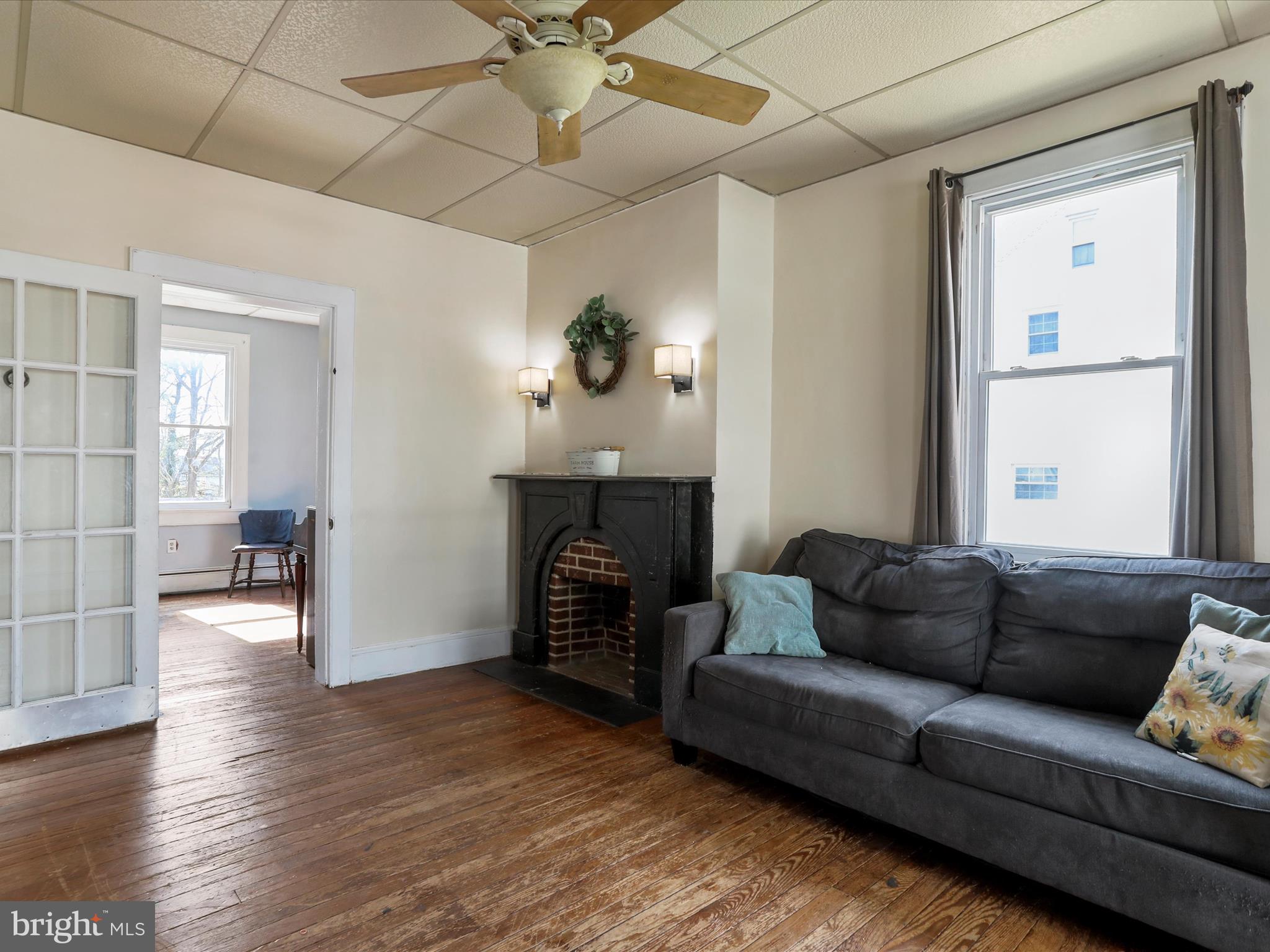 35 Middle Street Taneytown, MD 21787 - Photo 10 of 41 a living room with furniture and a fireplace