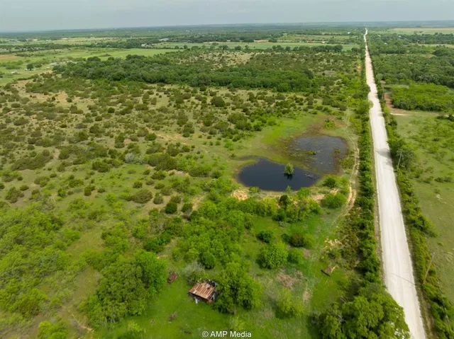 a view of a lake from a yard