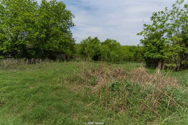 a view of a lake view with a garden