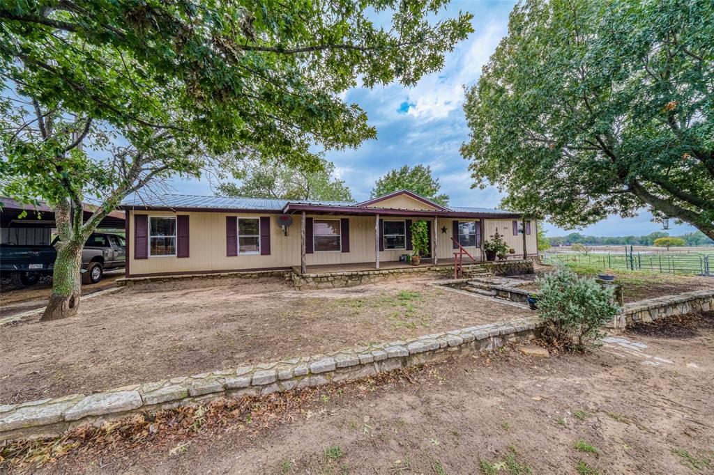 front view of a house with a patio