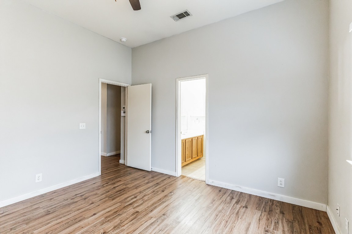 313 Caladium Drive Georgetown, TX 78626 - Photo 17 of 36 a view of empty room with wooden floor