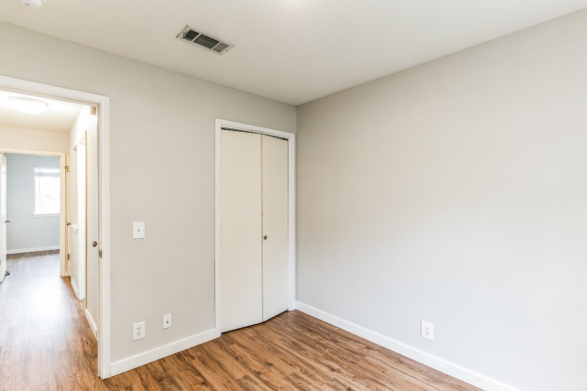 313 Caladium Drive Georgetown, TX 78626 - Photo 24 of 36 a view of a room with wooden floor