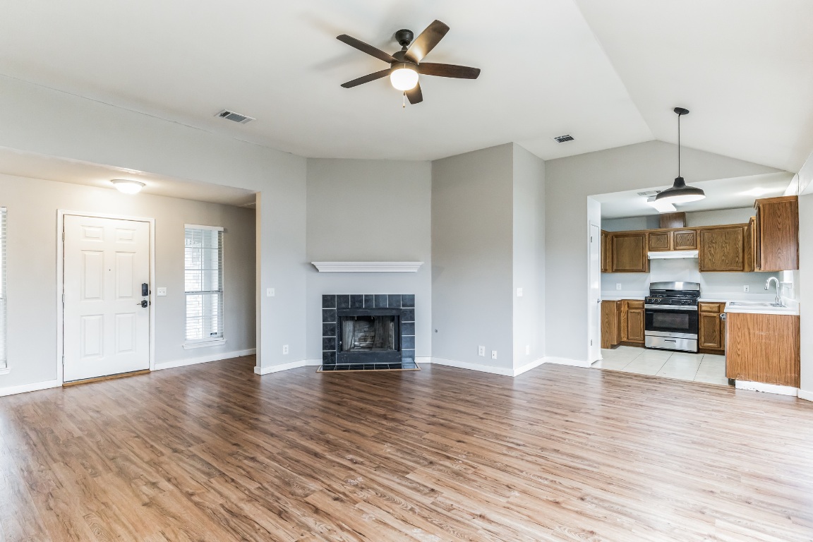 313 Caladium Drive Georgetown, TX 78626 - Photo 8 of 36 a view of a kitchen with furniture and wooden floor