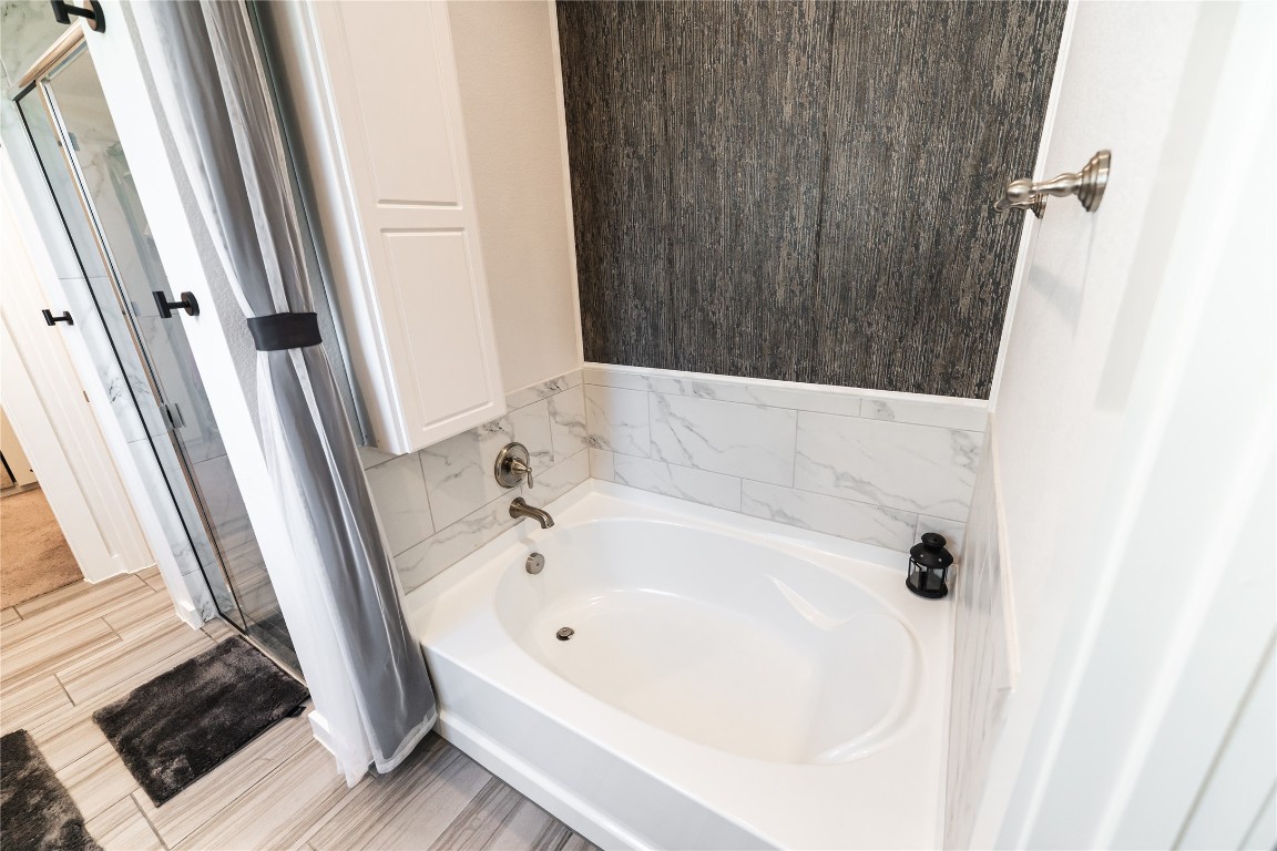 608 Pecan Bottom Trail Georgetown, TX 78628 - Photo 15 of 30 Full bathroom with a garden tub