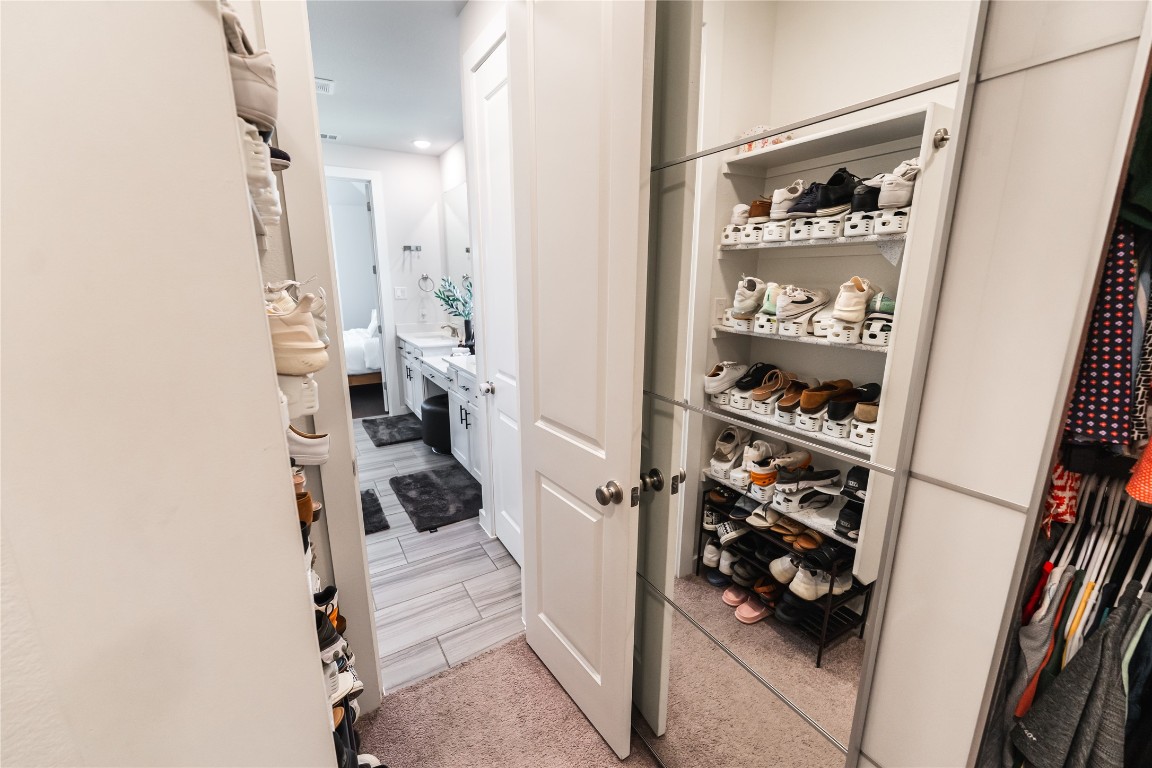 608 Pecan Bottom Trail Georgetown, TX 78628 - Photo 16 of 30 Walk in closet with wood finish floors