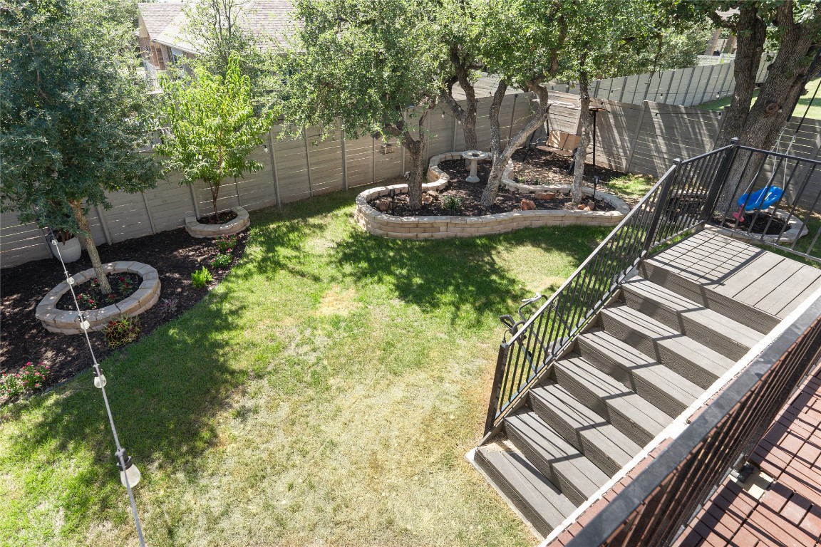 608 Pecan Bottom Trail Georgetown, TX 78628 - Photo 26 of 30 Fenced backyard with stairs