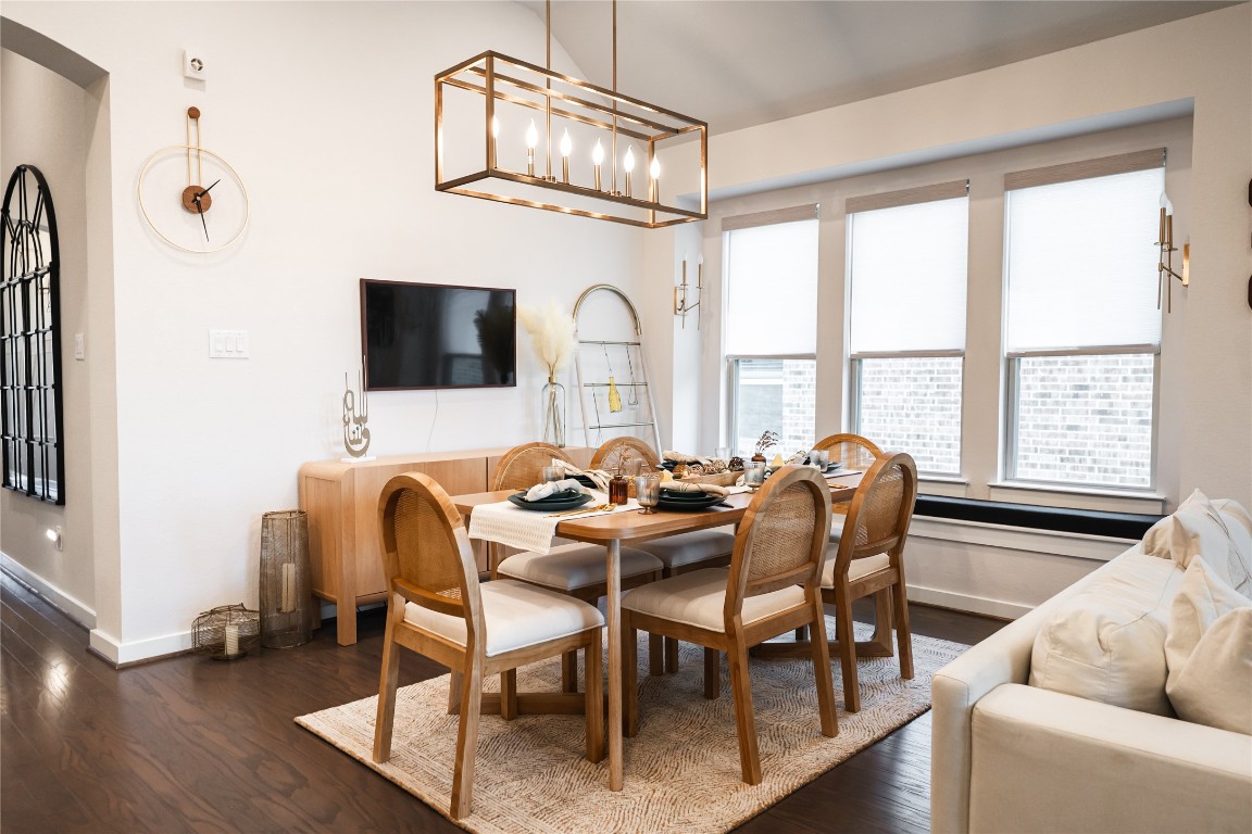 608 Pecan Bottom Trail Georgetown, TX 78628 - Photo 8 of 30 Dining area with dark wood-type flooring and baseboards