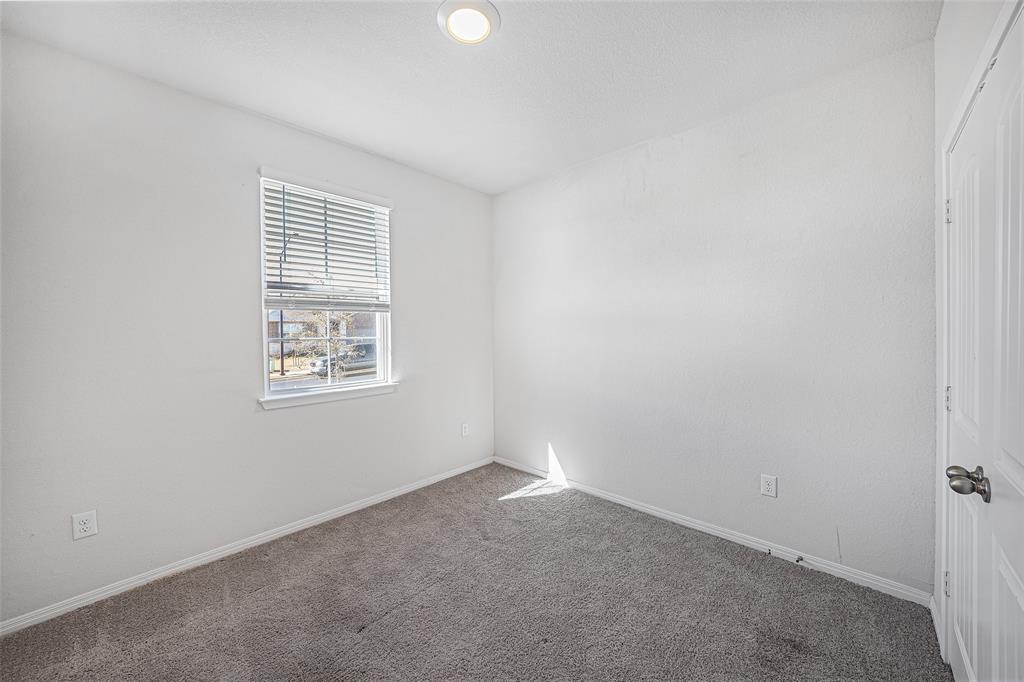 121 Mackinac Lane Georgetown, TX 78626 - Photo 12 of 16 an empty room with windows