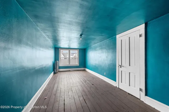 a view of a house with a balcony