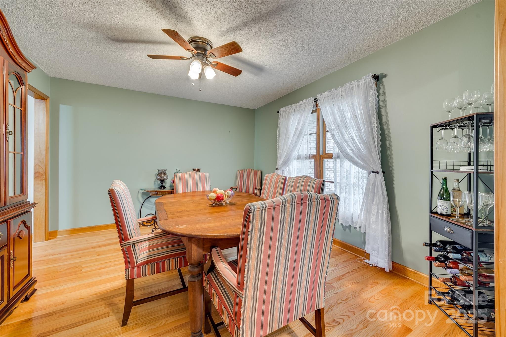 1221 Edgefield Road York, SC 29745 - Photo 6 of 38 a view of a dining room with furniture window and wooden floor