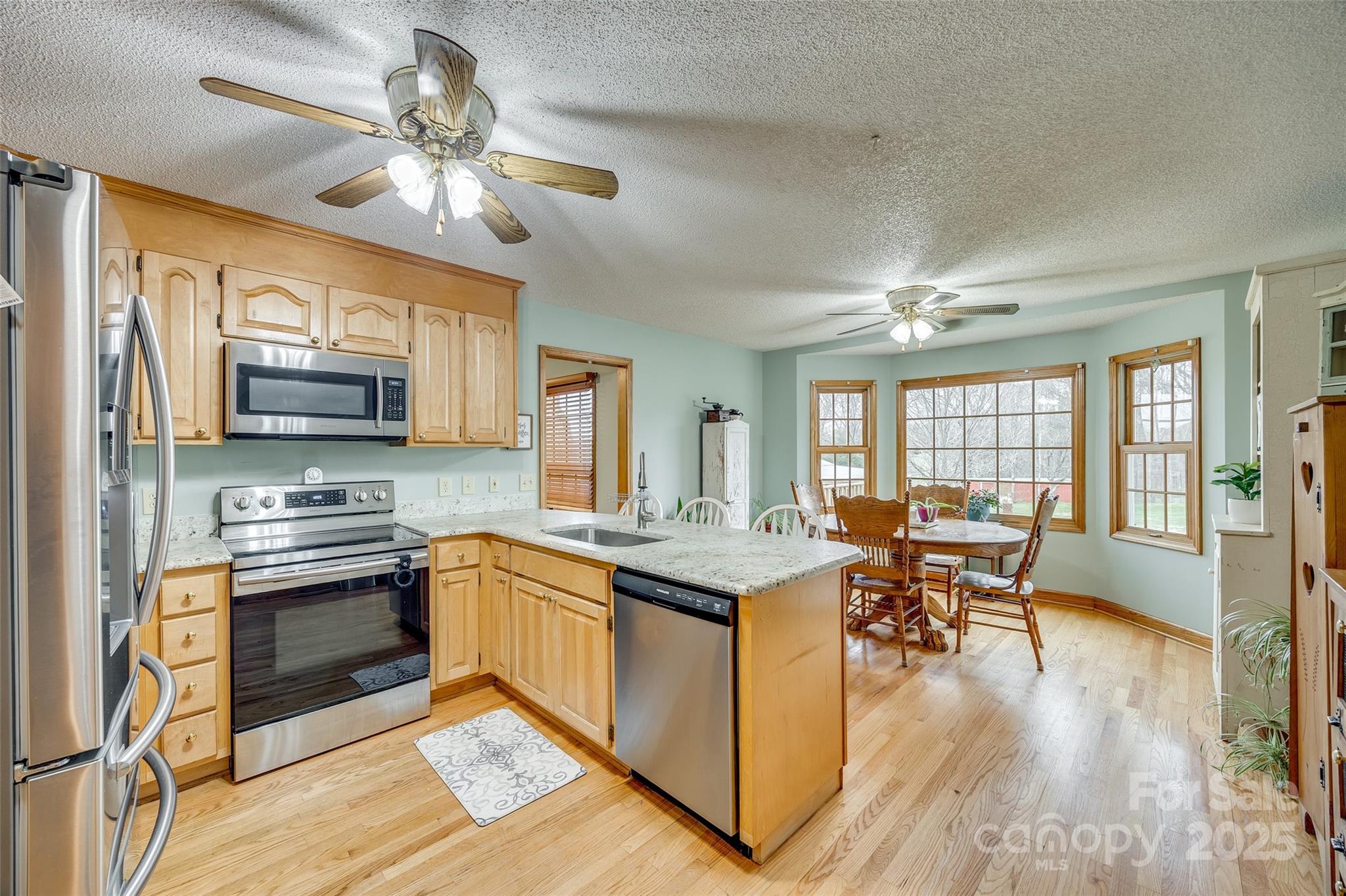 1221 Edgefield Road York, SC 29745 - Photo 9 of 38 a view of kitchen with sink and microwave