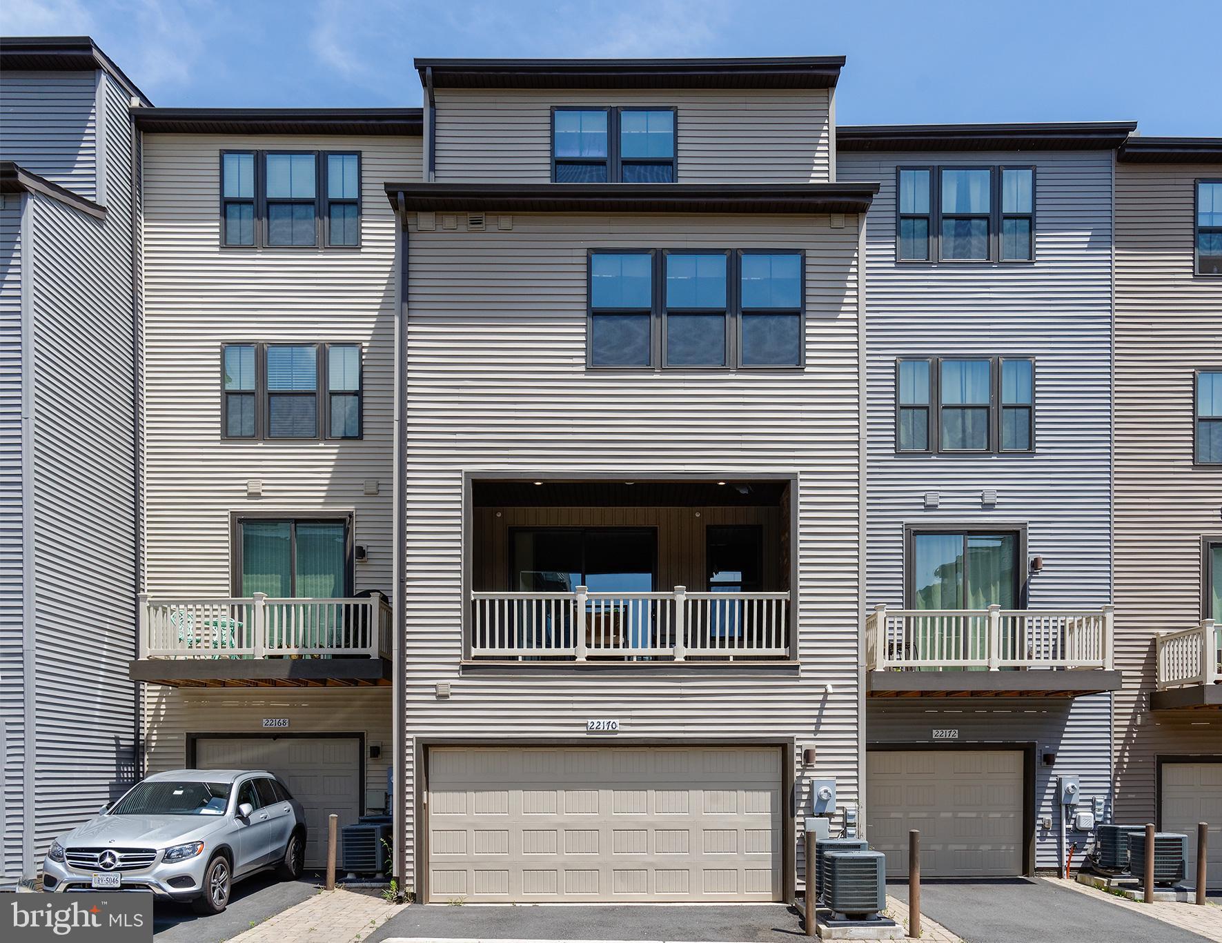 22170 Maple Tree Terrace Ashburn, VA 20148 - Photo 6 of 45 2 Car Garage and Driveway, Rear Covered Deck