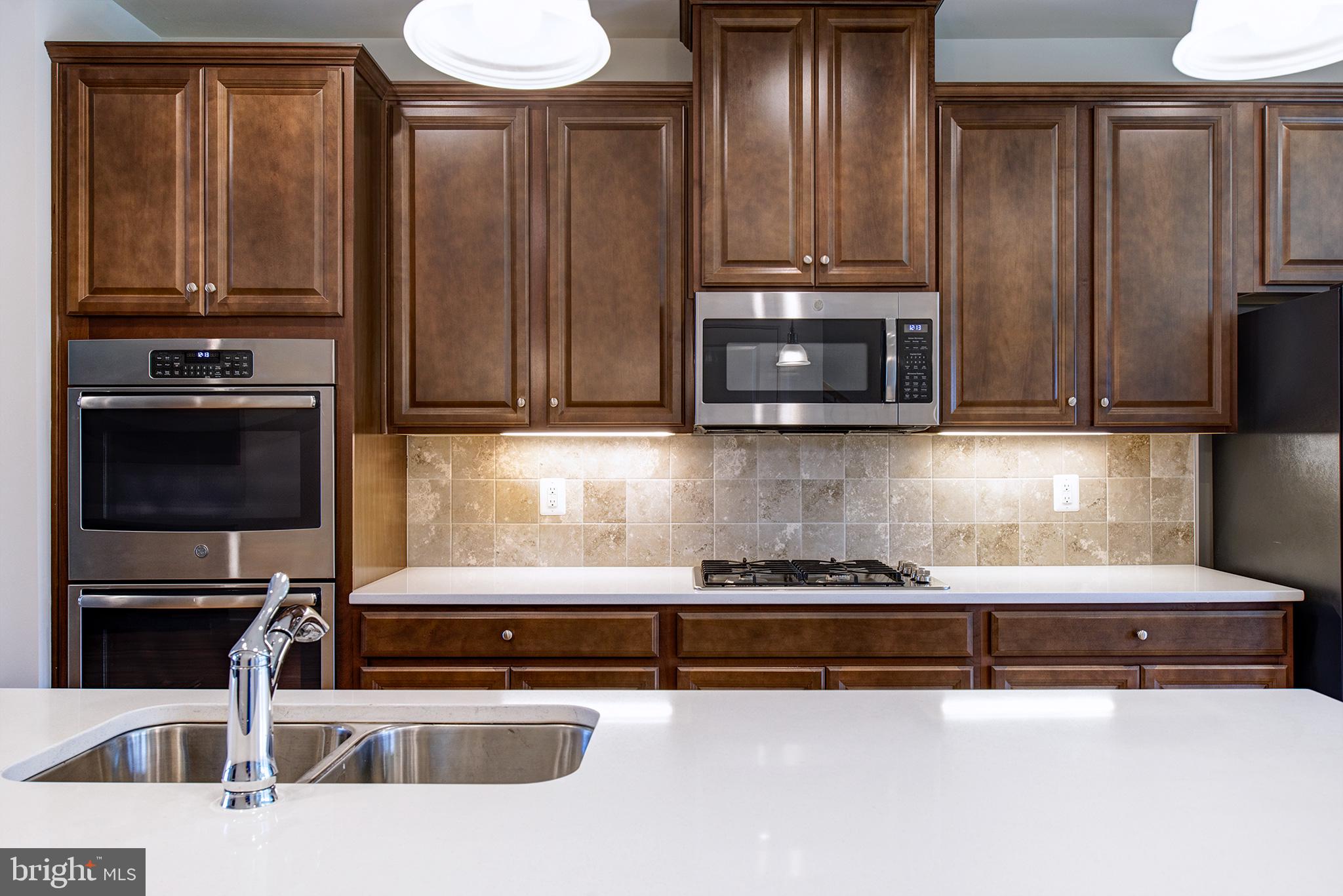 22170 Maple Tree Terrace Ashburn, VA 20148 - Photo 7 of 45 GE Stainless Appliances, Double Ovens, Gas Cooktop