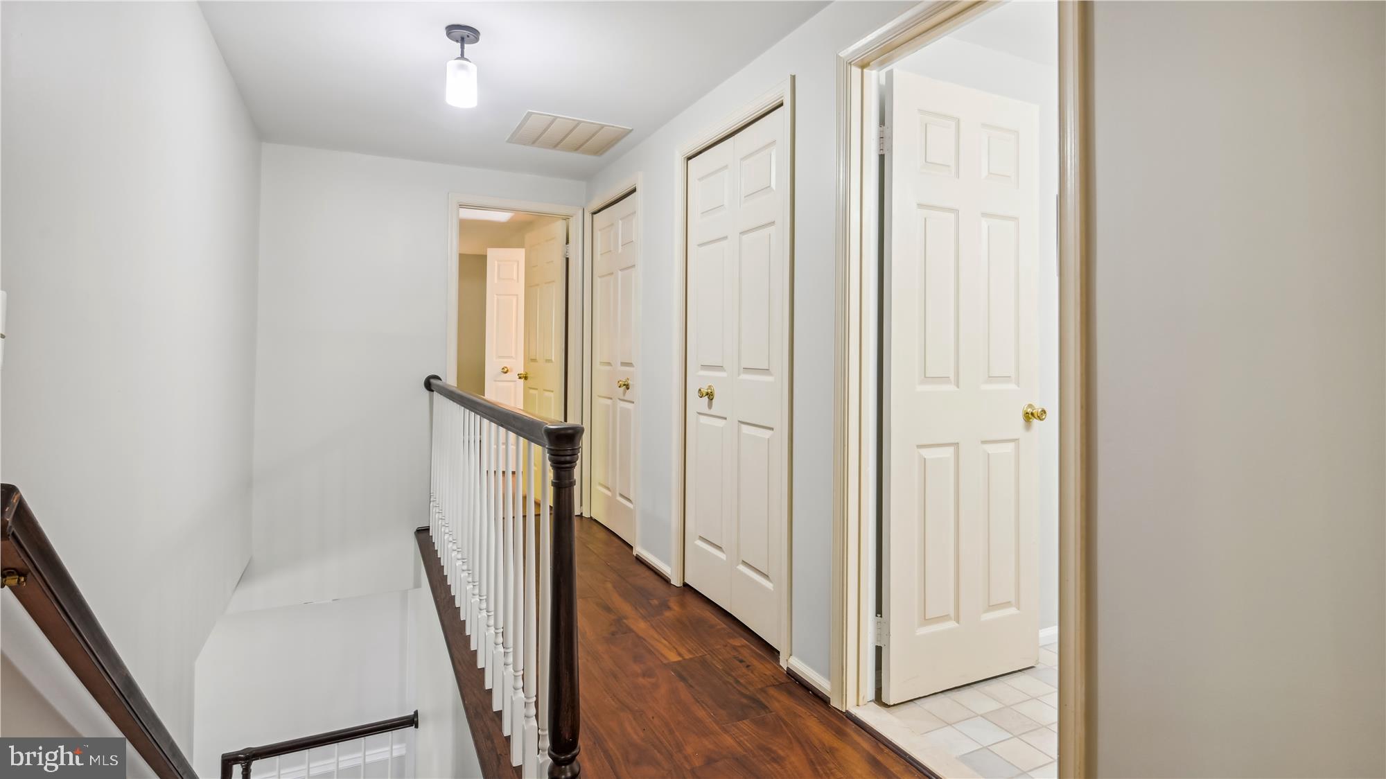 115 Hamilton Road Sterling, VA 20165 - Photo 14 of 30 Wood floors carry upstairs!