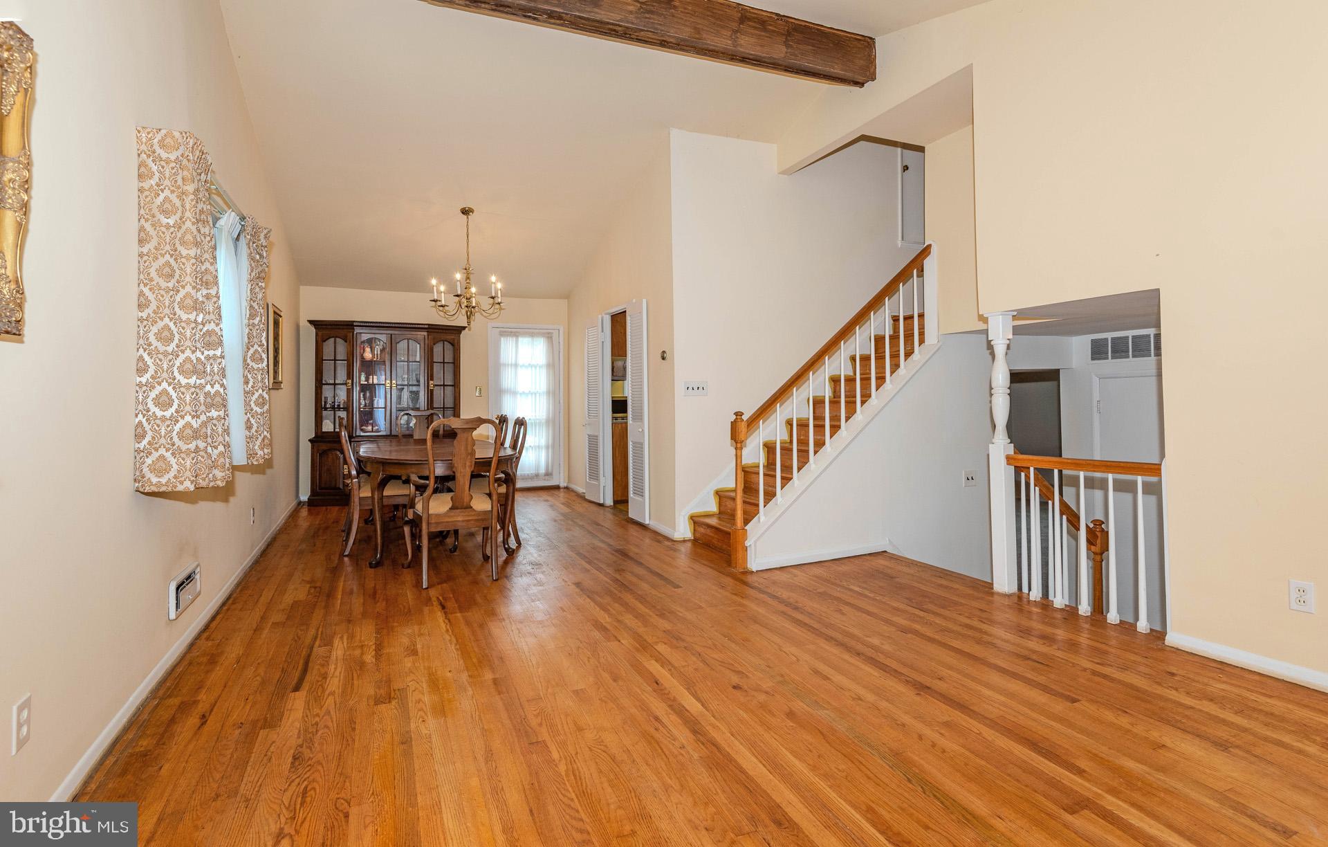 208 Ardmore Road Linthicum Heights, MD 21090 - Photo 13 of 58 a view of dining room and hall with wooden floor