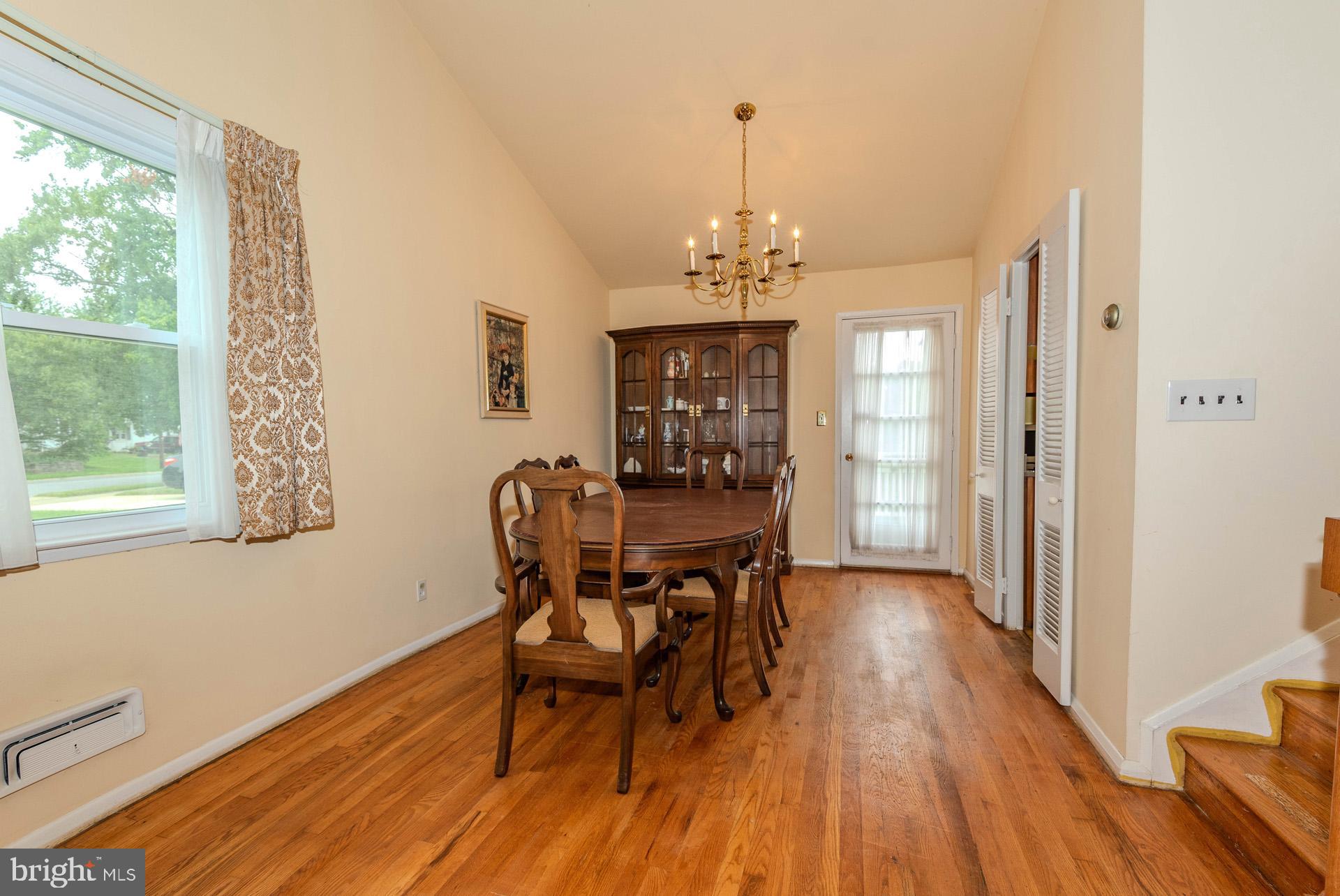 208 Ardmore Road Linthicum Heights, MD 21090 - Photo 14 of 58 a view of a dining room with furniture window and wooden floor