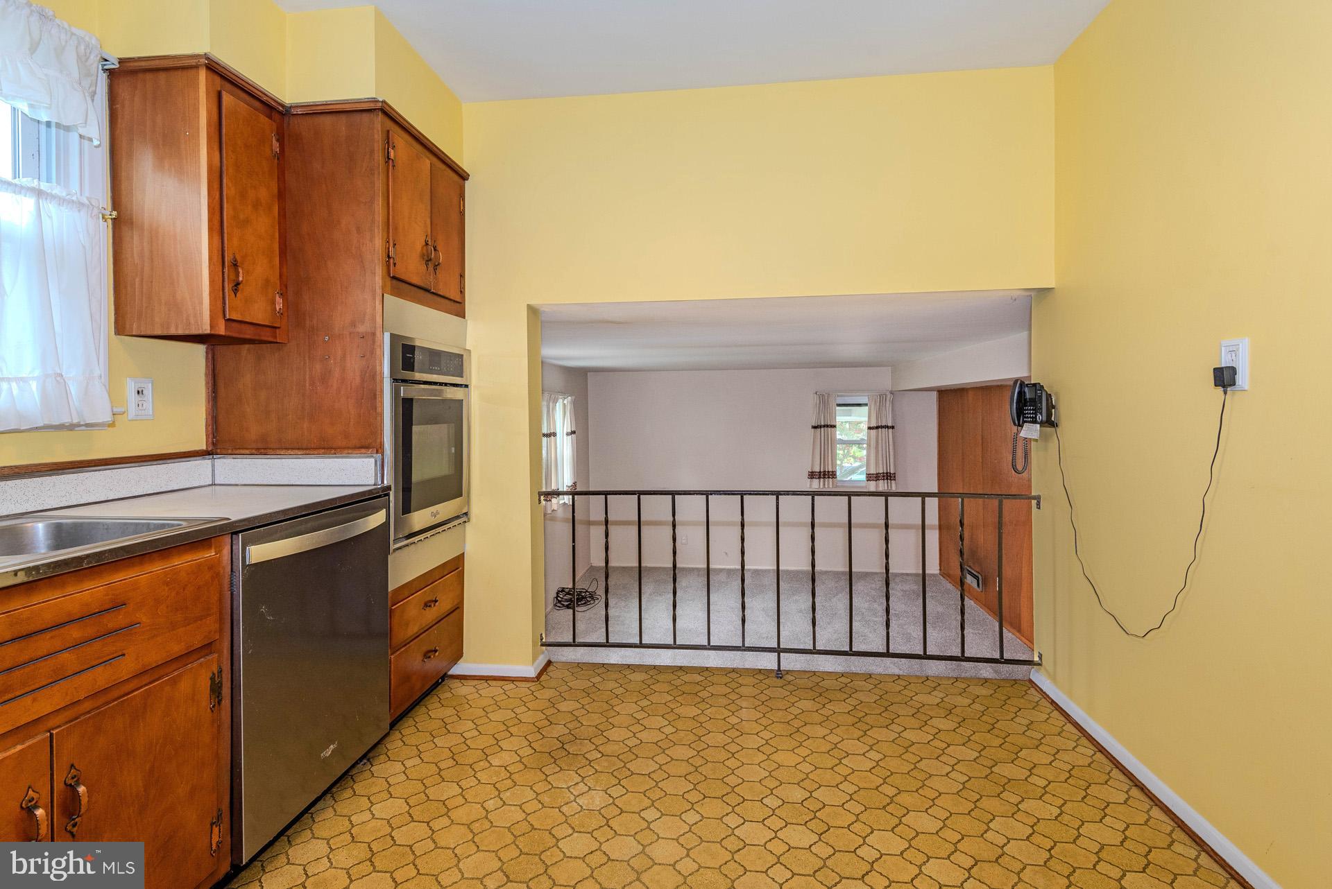 208 Ardmore Road Linthicum Heights, MD 21090 - Photo 19 of 58 Overlook to family room from kitchen